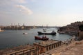 Valletta, Malta, August 2015. Magnificent sea view of the islandÃ¢â¬â¢s main harbor with cargo ships. Royalty Free Stock Photo